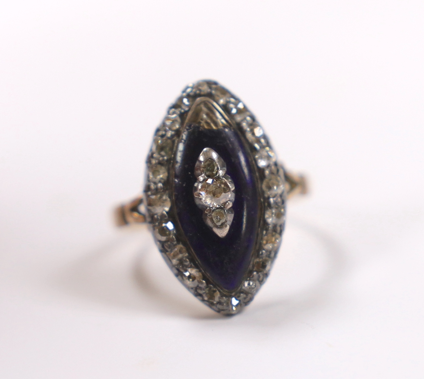A 19th century yellow metal, enamel and rose cut diamond cluster set navette shaped ring (a.f.), size K, gross weight 5.4 grams.